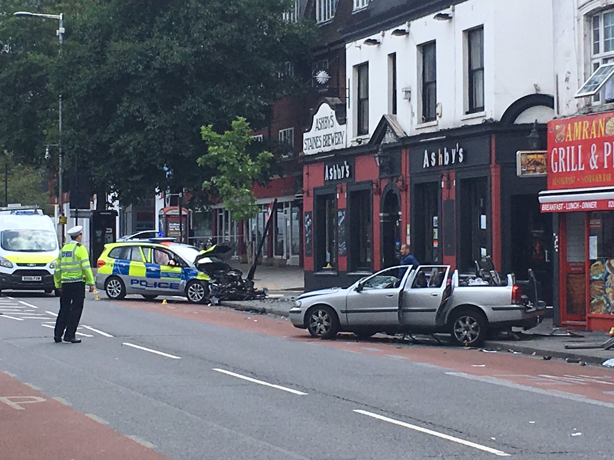 Three in hospital after horrifying smash involving marked police car crash in West Ealing﻿