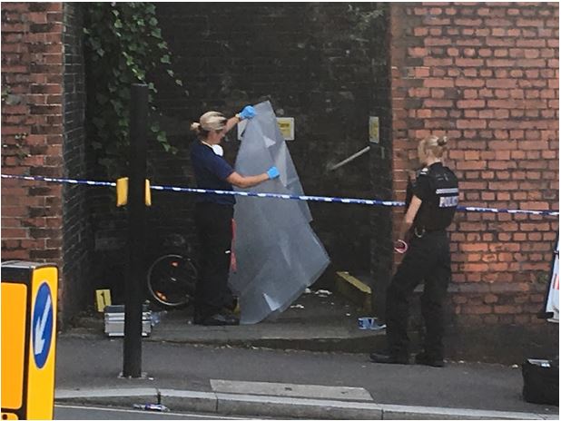 A police cordon remains in place in Redhill today following reports that a six-year-old boy was bundled into a black van, leaving his mountain bike on the street