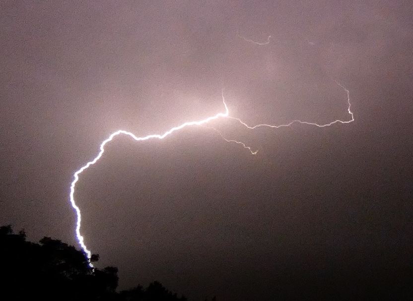 Dramatic lightning strikes caught on camera as Britain battered by thunderstorms
