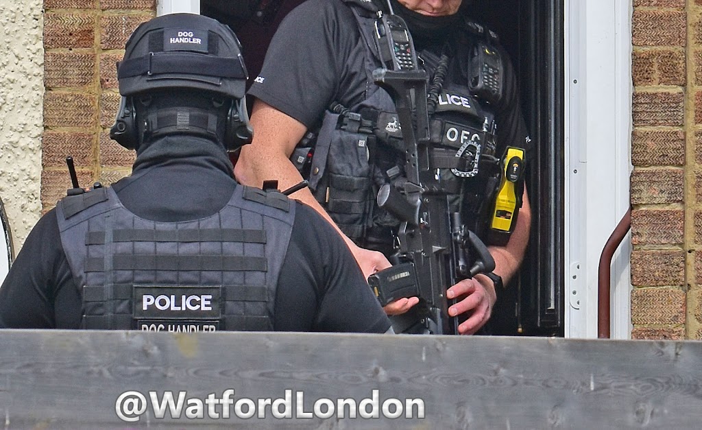 Armed police Manhunt watford