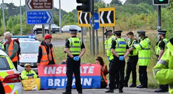 Climate protesters block A41 M25 roundabout with Police make arrests