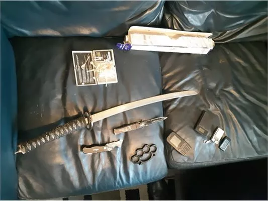 Over 100 weapons including Axes and knives found during raid