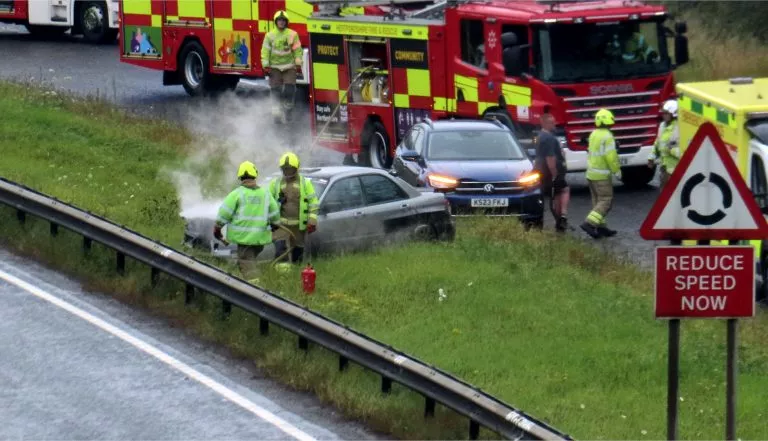 Emergency Services Attend to Car Incident on A41 carriageway