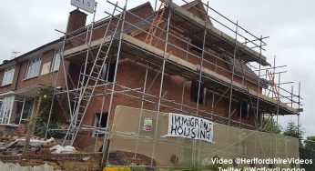 Immigrant Housing Graffiti Banner put on house on the day of the EU Referendum Vote